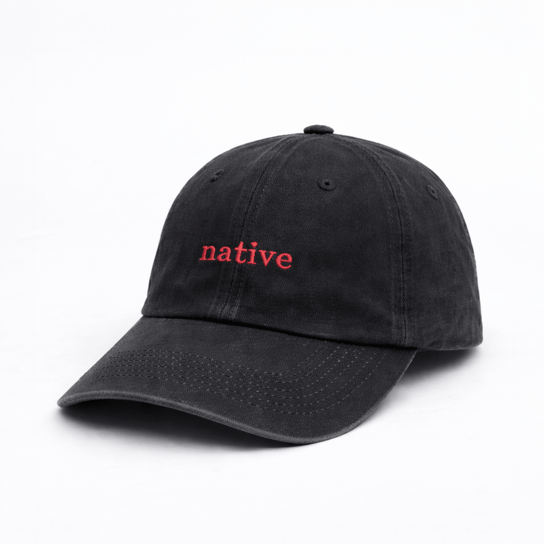 Black cap with 'native' embroidered in red on a white background